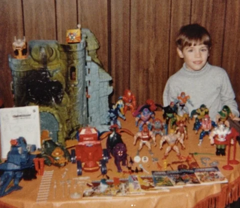 Childhood photo with a vintage Masters of the Universe collection